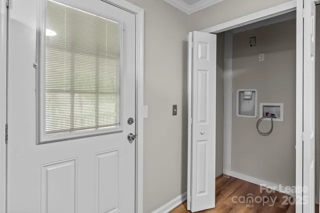 a bathroom with a shower and a sink