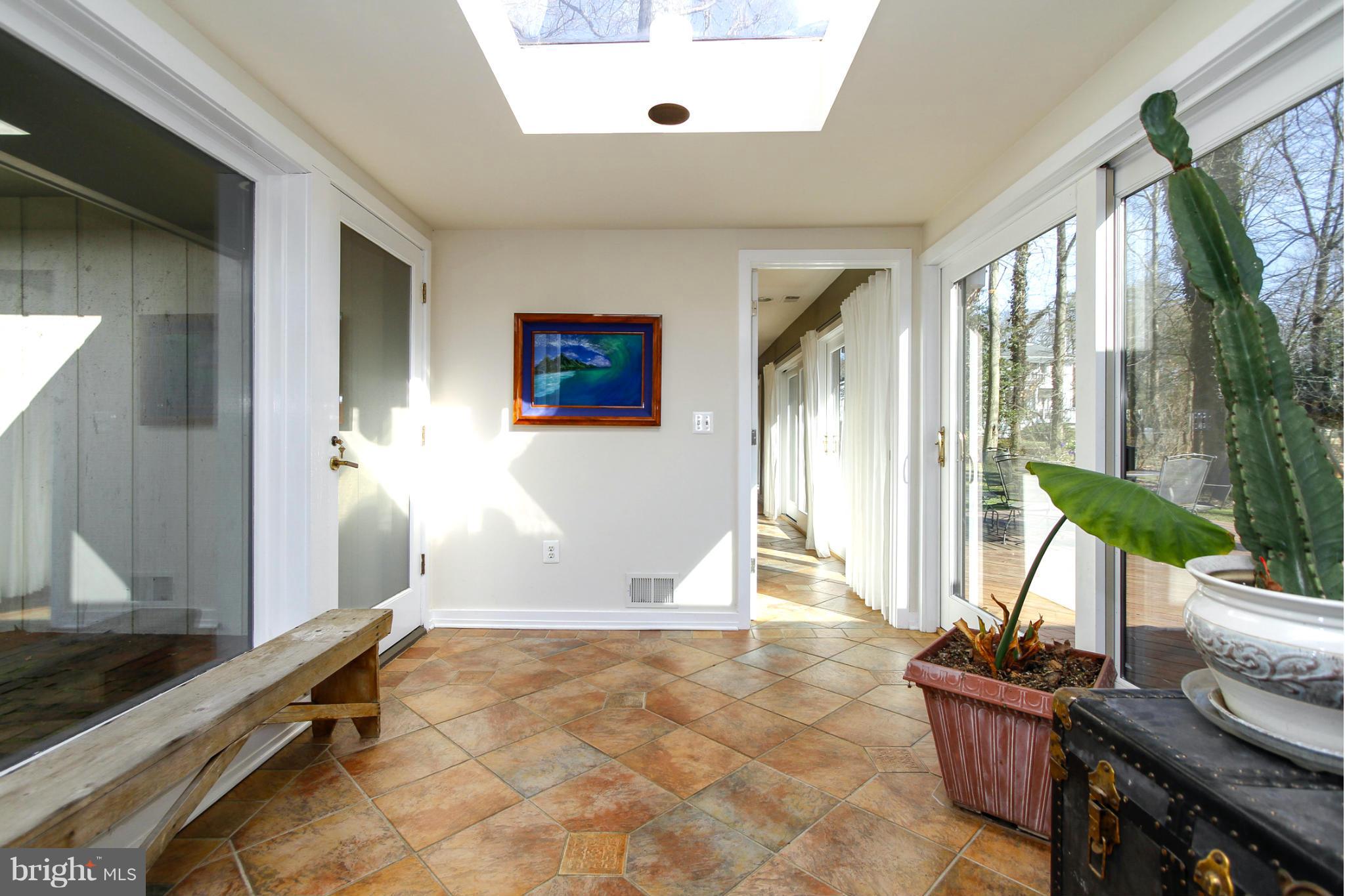 3055 Rundelac Road Annapolis, MD 21403 - Photo 18 of 30 Atrium Spilling into the Outdoors