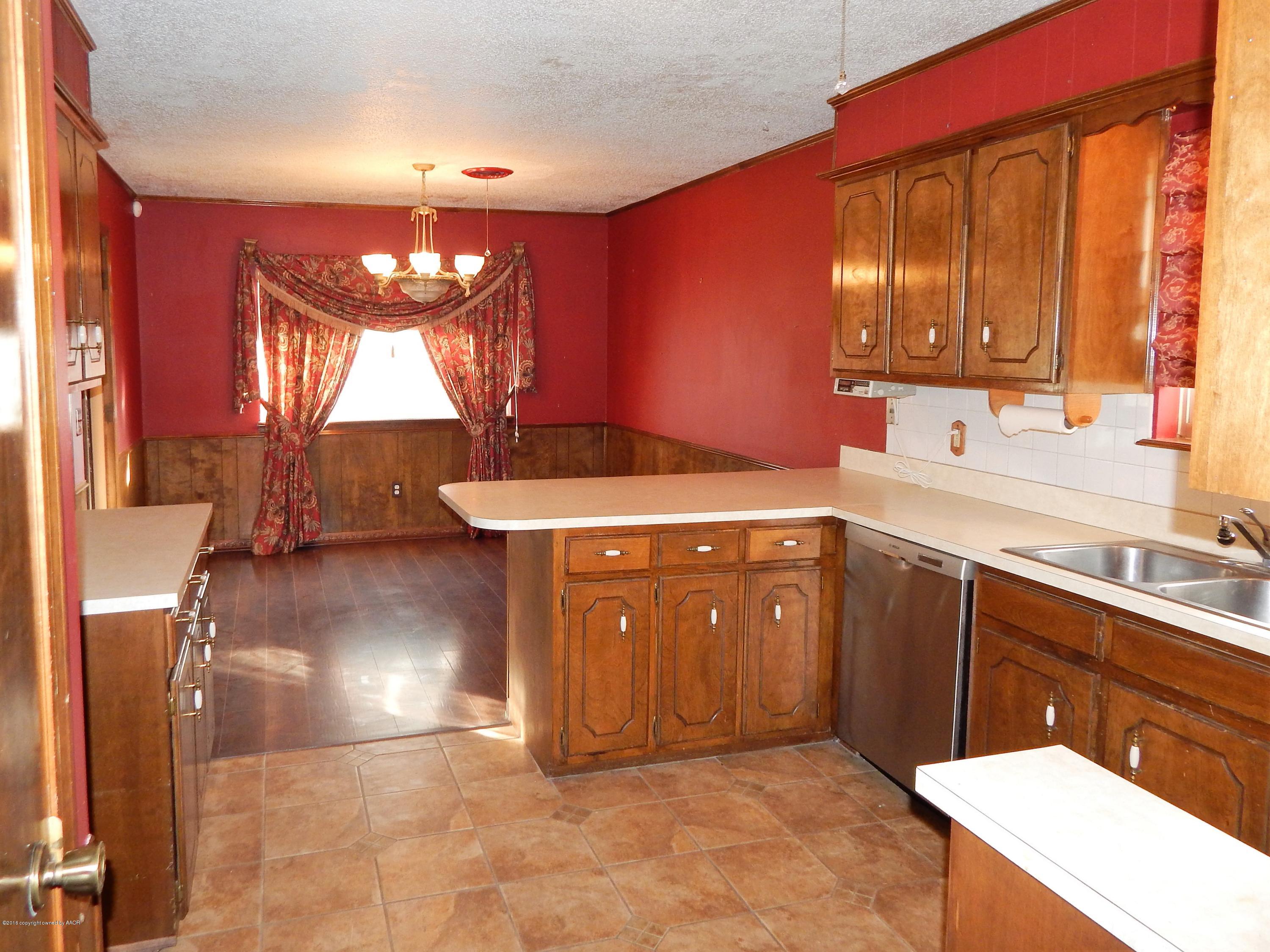 2217 Gresham Drive Amarillo, TX 79110 - Photo 12 of 32 KITCHEN INTO DINING