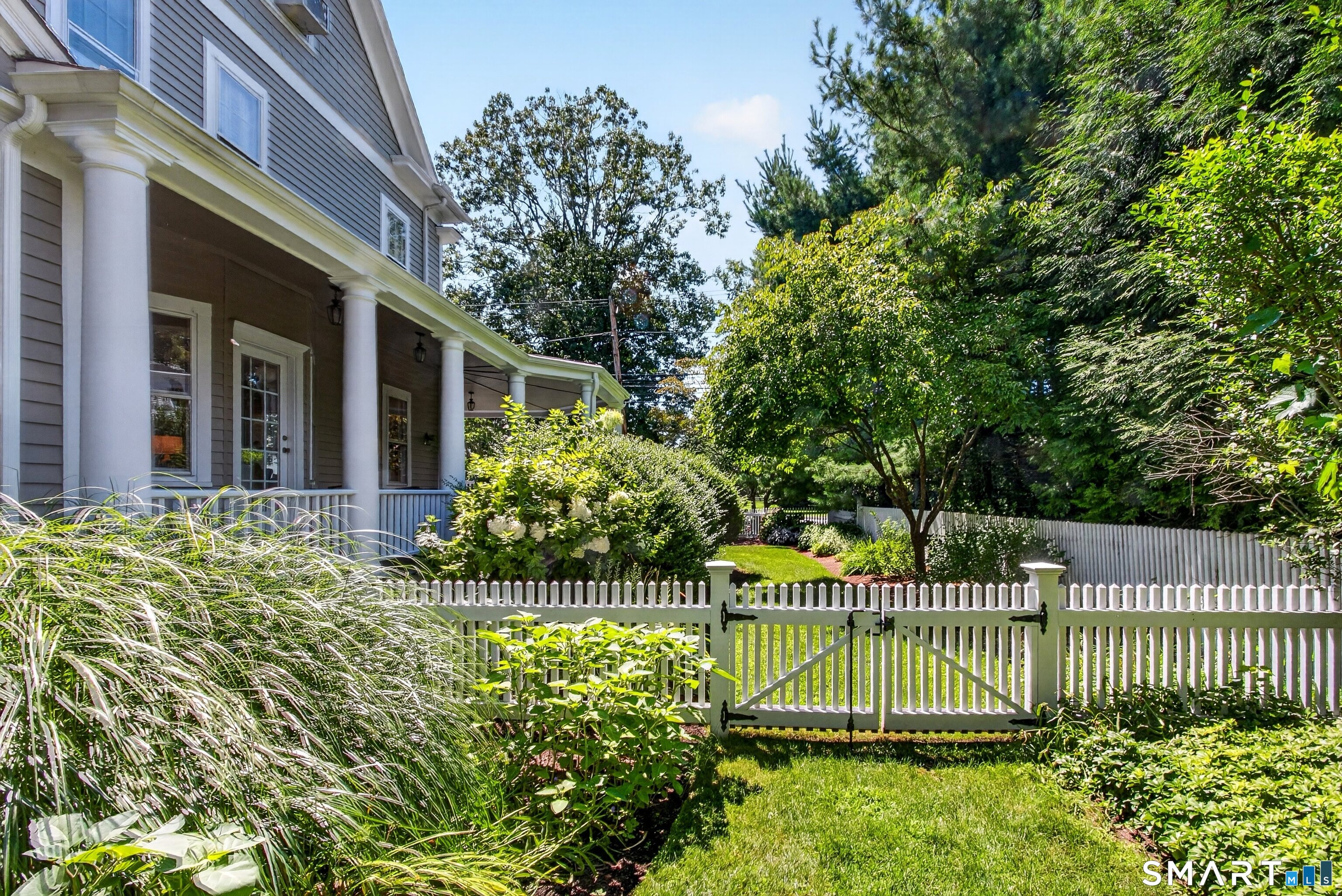 239 Beach Road Fairfield, CT 06824 - Photo 32 of 40 Fenced in, private backyard. Professionally landscaped.