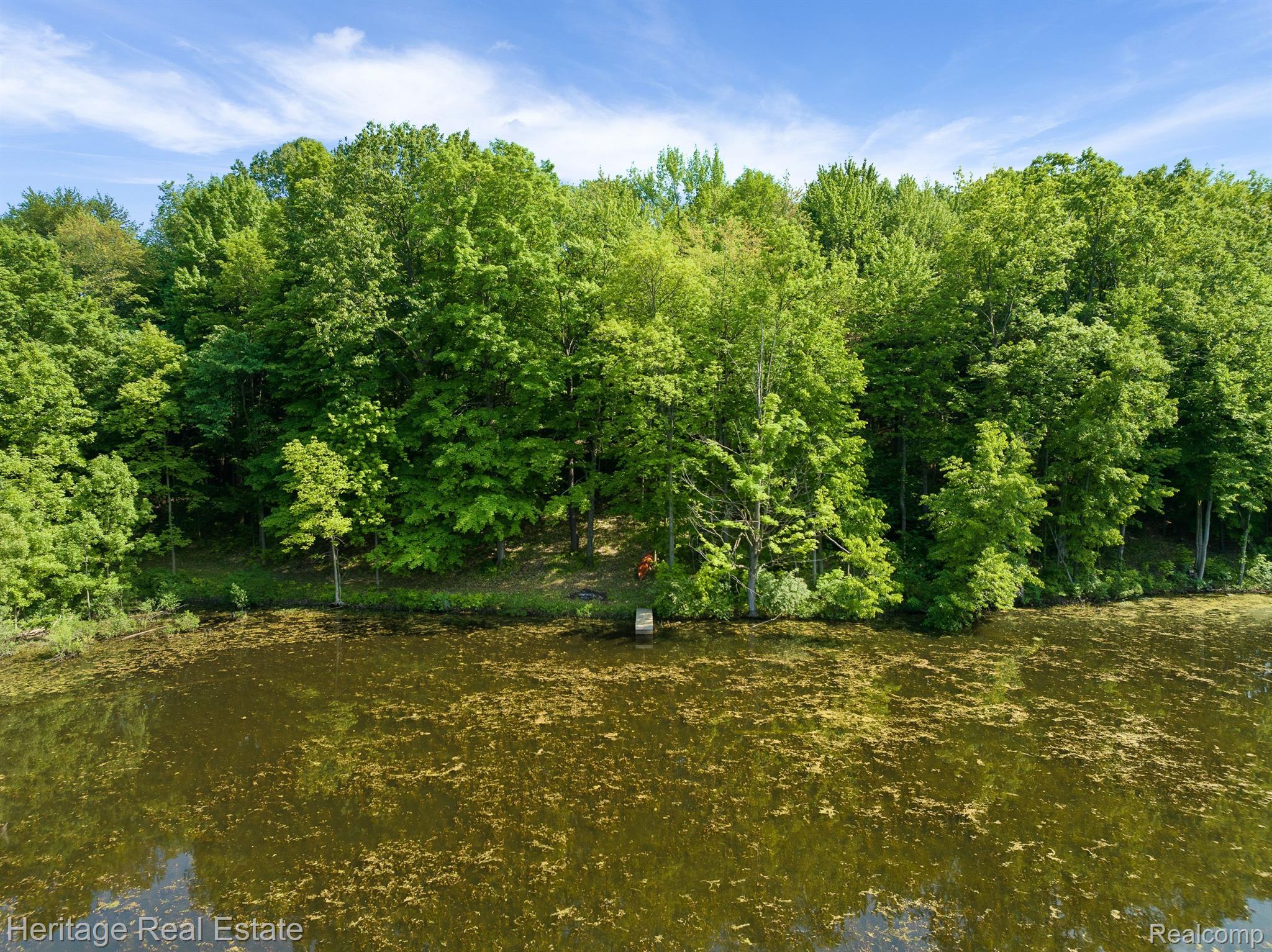 3190 West Brocker Road Metamora, MI 48455 - Photo 3 of 75 Over 400' waterfront on scenic private lake