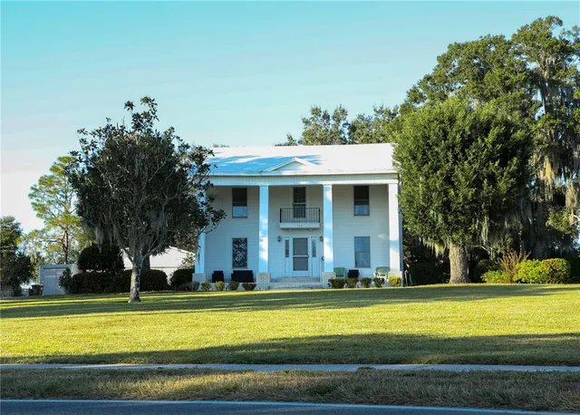 a view of a house with a swimming pool