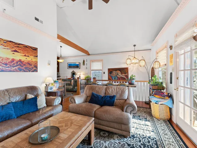 a living room with furniture and a couch