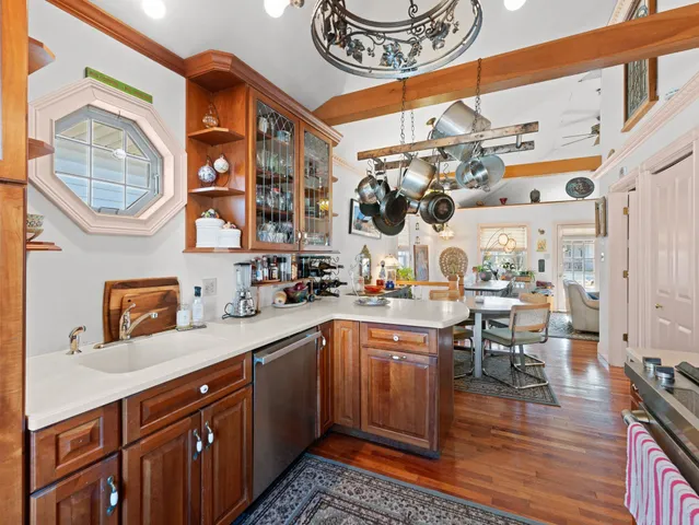 a kitchen with a sink and cabinets