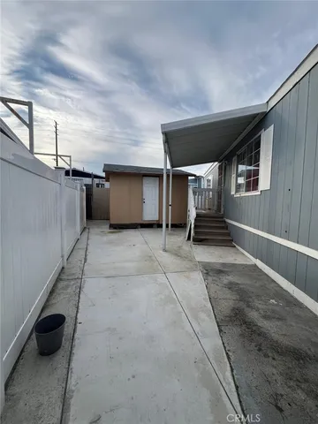 a view of a backyard of the house