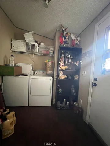 a view of backyard and car parked