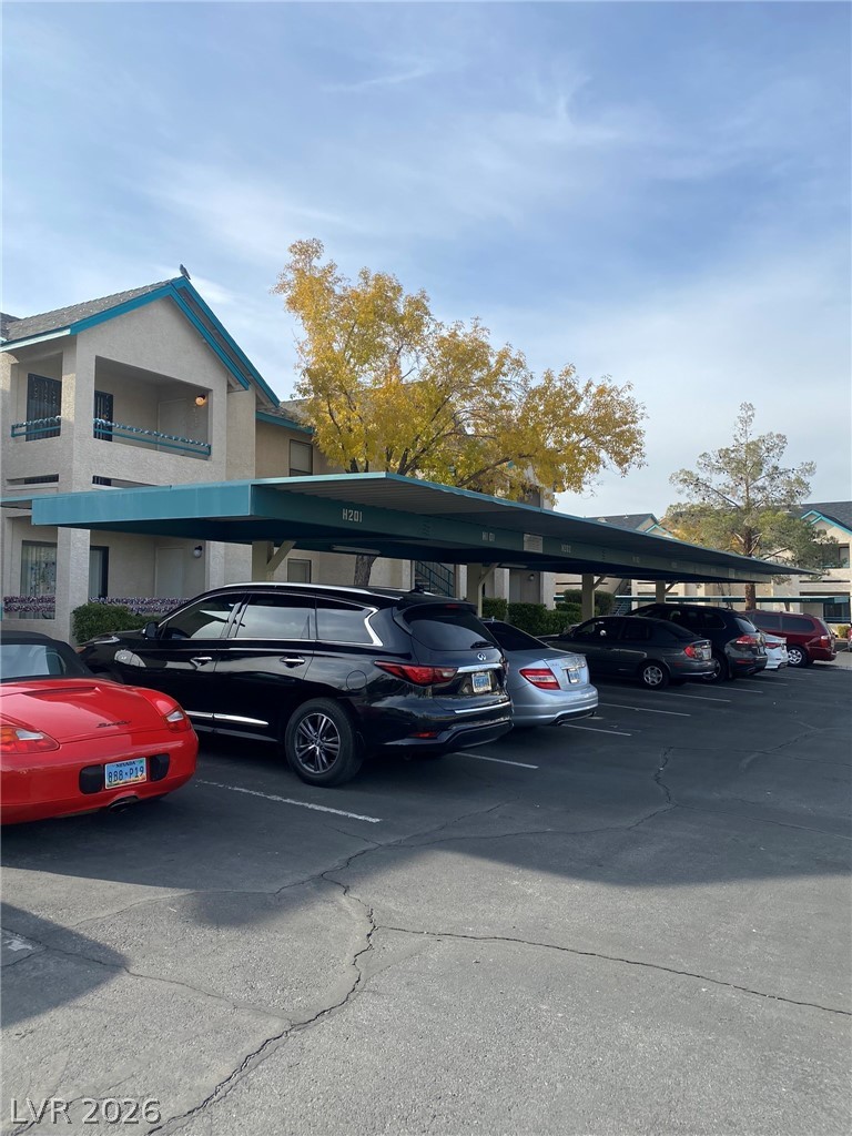 5271 South Lindell Road, Unit 202 Las Vegas, NV 89118 - Photo 25 of 27 Covered parking offers convenience and protection for vehicles.