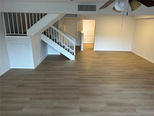a view of entryway with wooden floor