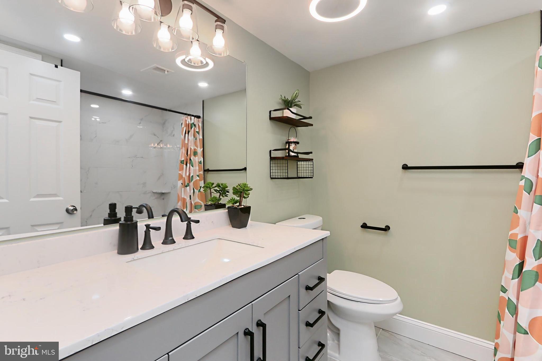 8318 K Kingsgate Road, Unit 545 Springfield, VA 22152 - Photo 15 of 56 Gorgeous, spa-like primary bath. Vanity w/quartz