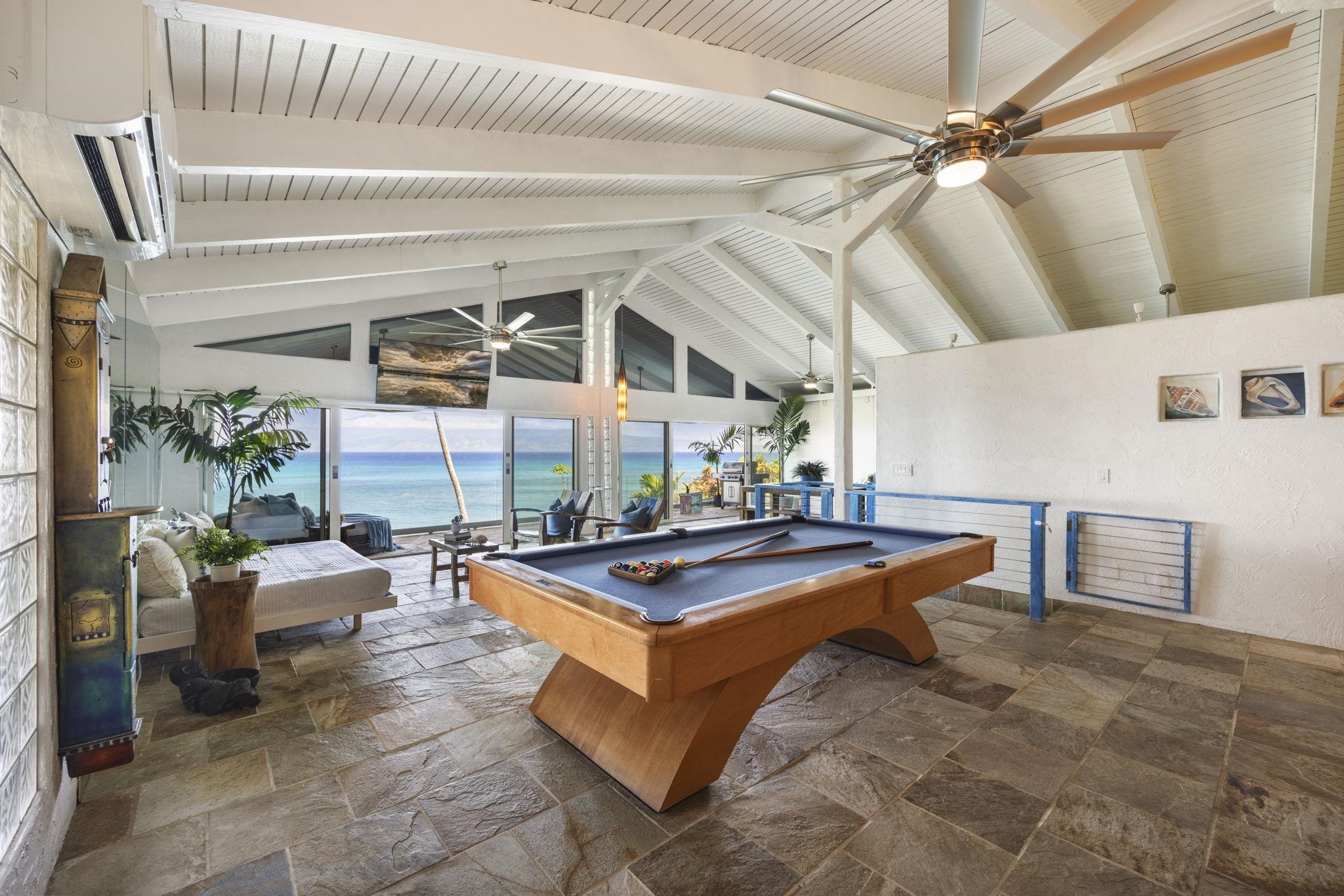 5171 Lower Honoapiilani Road Lahaina, HI 96761 - Photo 13 of 48 a view of a livingroom with furniture and a ceiling fan