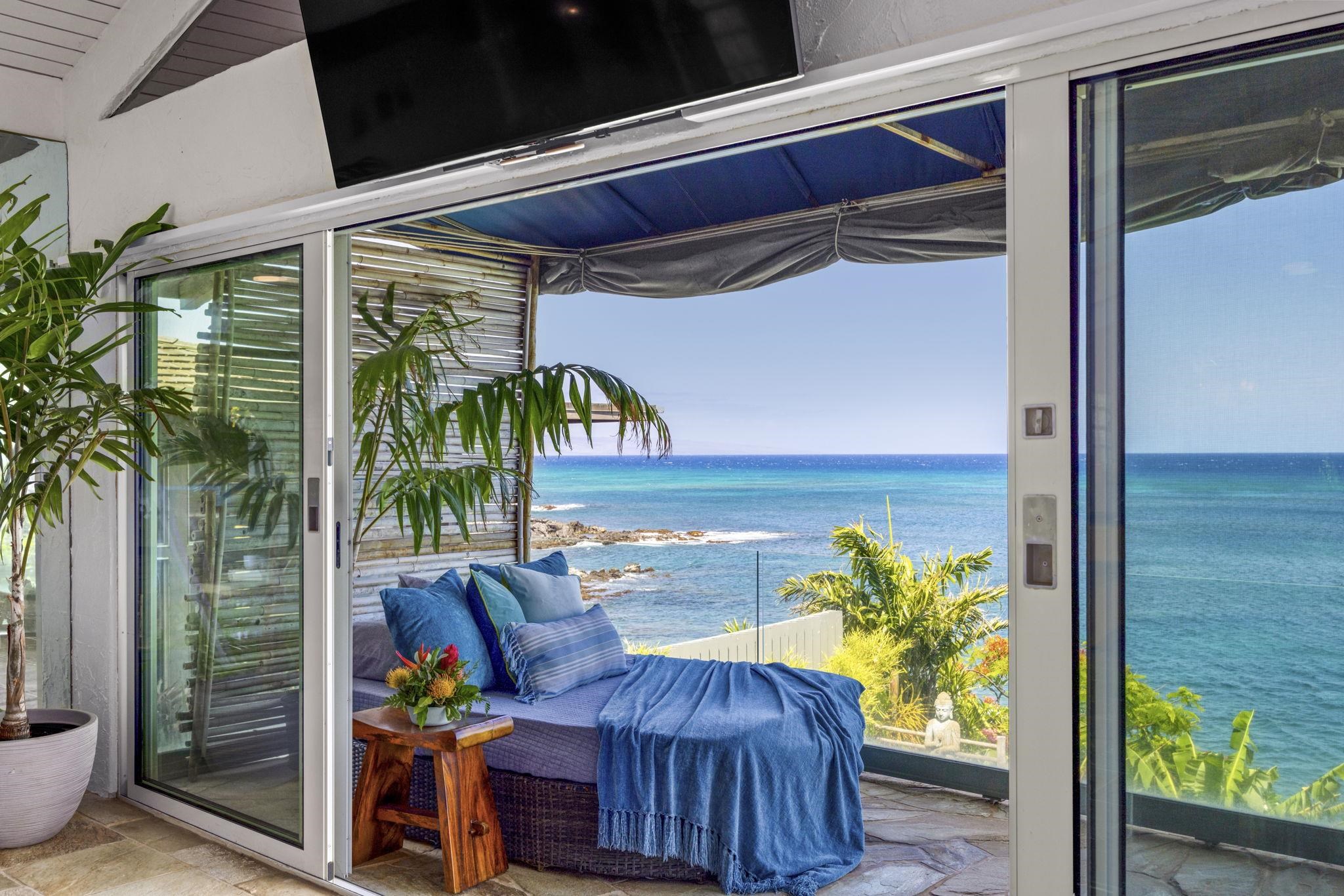 5171 Lower Honoapiilani Road Lahaina, HI 96761 - Photo 20 of 48 a view of balcony with outdoor seating and wooden floor