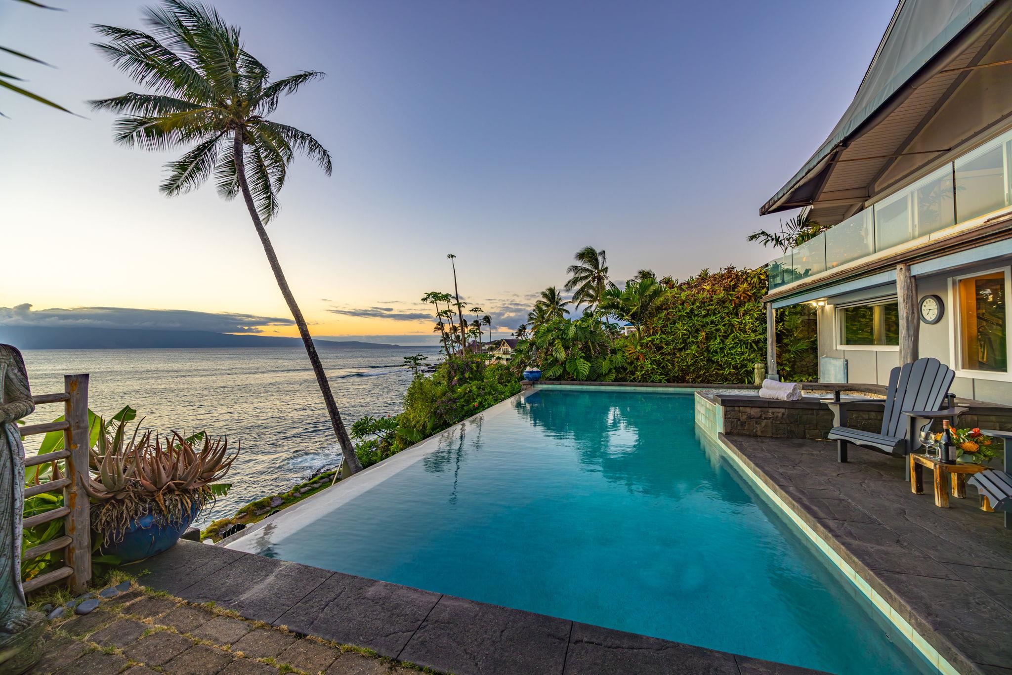 5171 Lower Honoapiilani Road Lahaina, HI 96761 - Photo 2 of 48 a view of a swimming pool with a deck