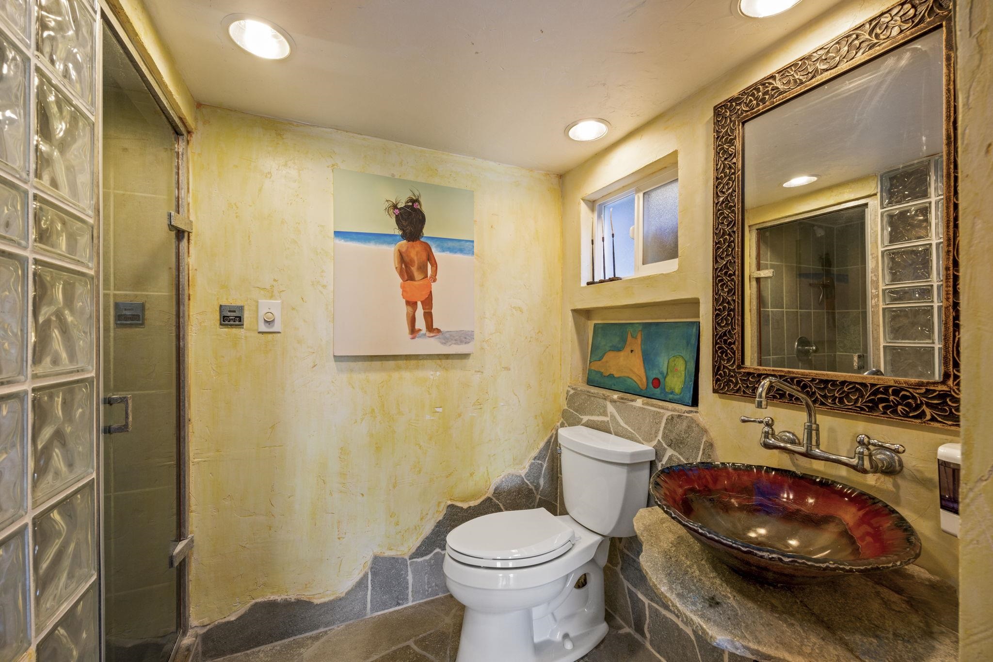 5171 Lower Honoapiilani Road Lahaina, HI 96761 - Photo 26 of 48 a bathroom with a sink toilet and shower