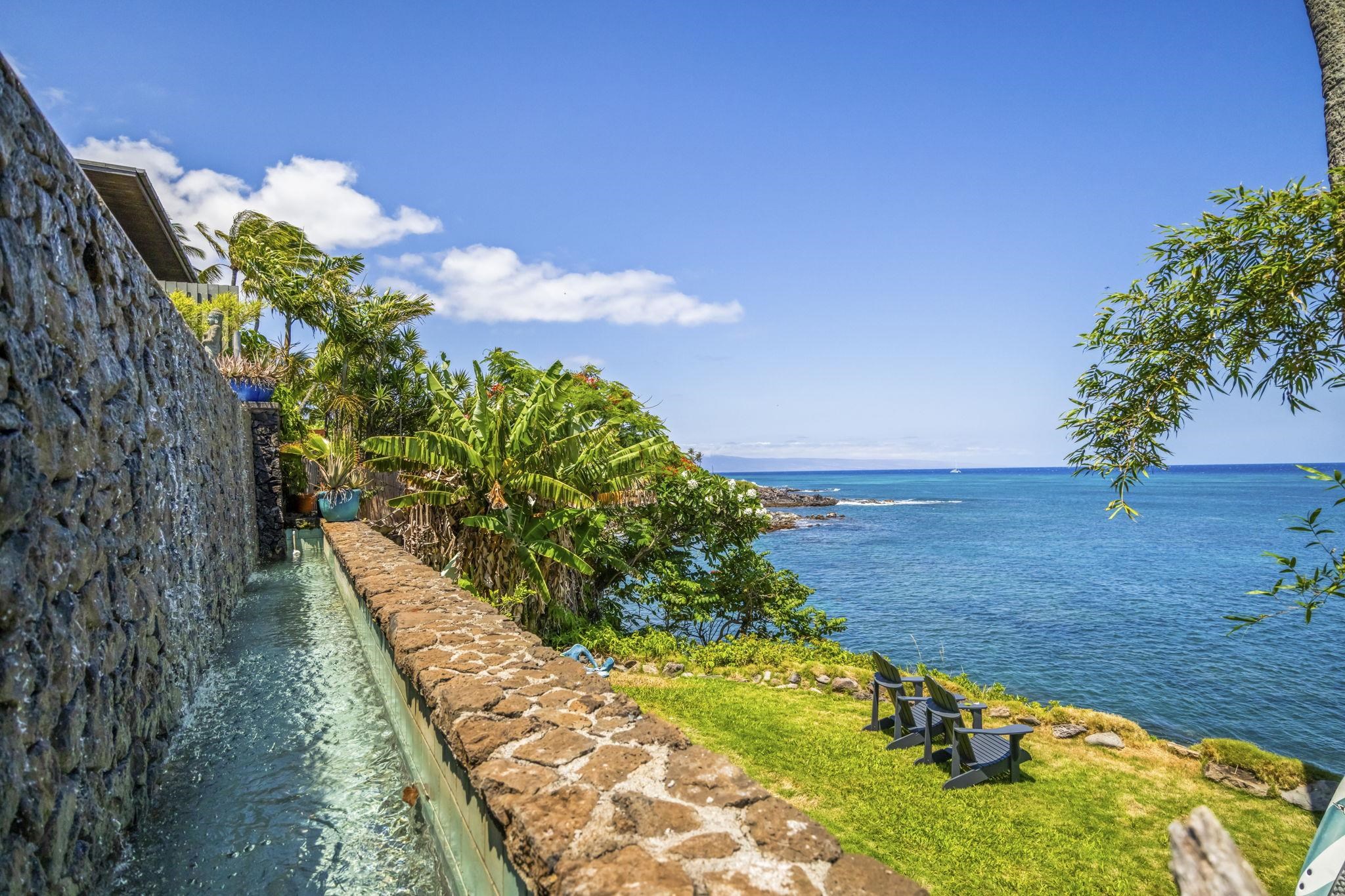 5171 Lower Honoapiilani Road Lahaina, HI 96761 - Photo 34 of 48 a view of a pathway with a yard