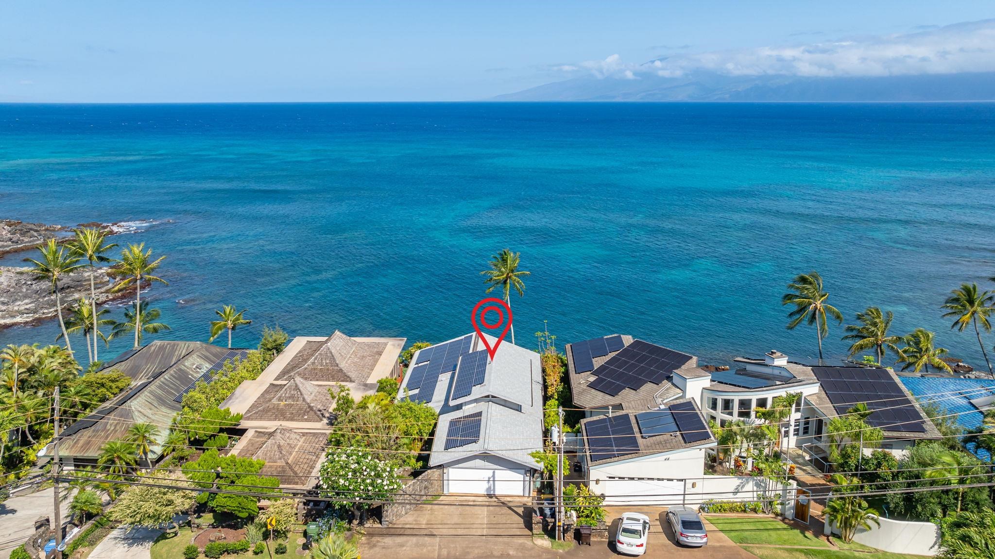 5171 Lower Honoapiilani Road Lahaina, HI 96761 - Photo 38 of 48 a aerial view of a house with a ocean view