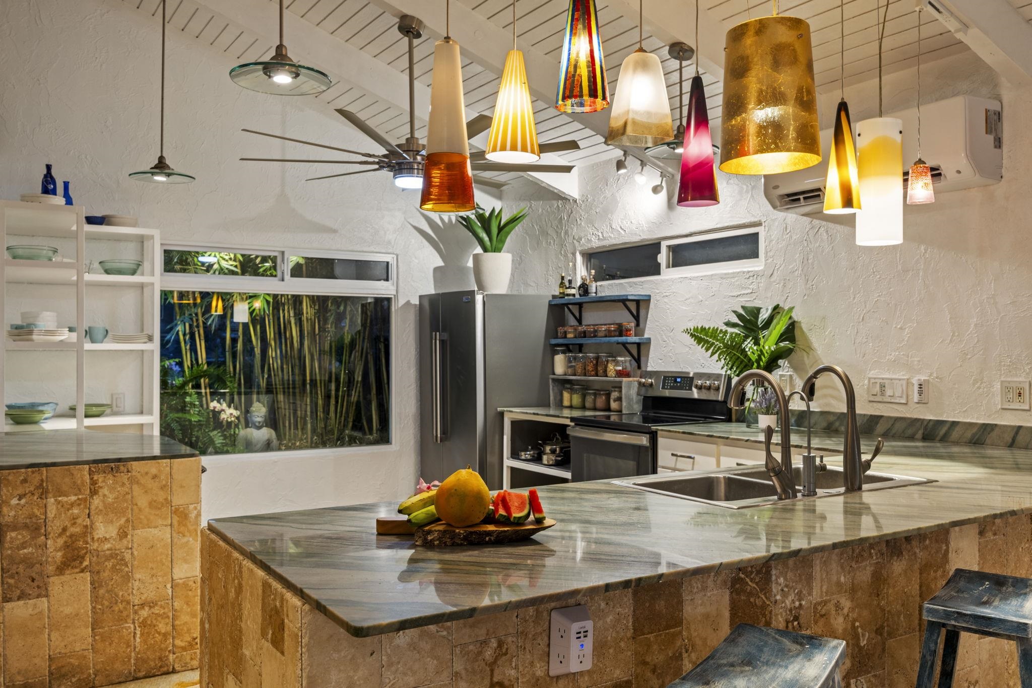 5171 Lower Honoapiilani Road Lahaina, HI 96761 - Photo 45 of 48 a kitchen with a sink a counter and cabinets