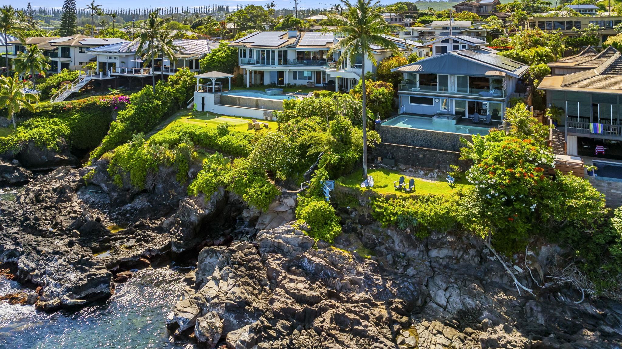 5171 Lower Honoapiilani Road Lahaina, HI 96761 - Photo 46 of 48 a view of a house with a yard and garden