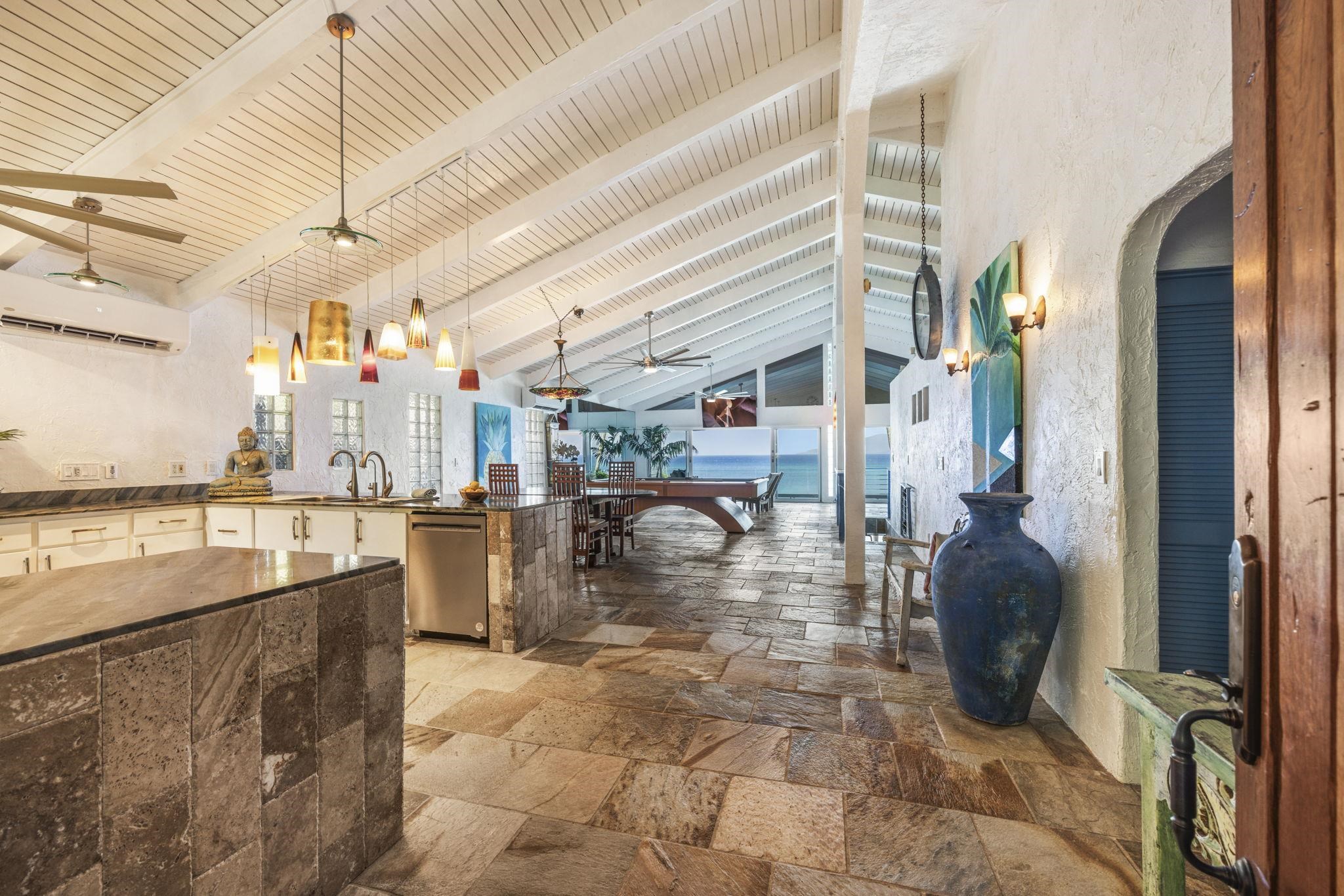 5171 Lower Honoapiilani Road Lahaina, HI 96761 - Photo 5 of 48 a view of a swimming pool with a patio