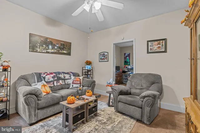 a living room with furniture and a couch