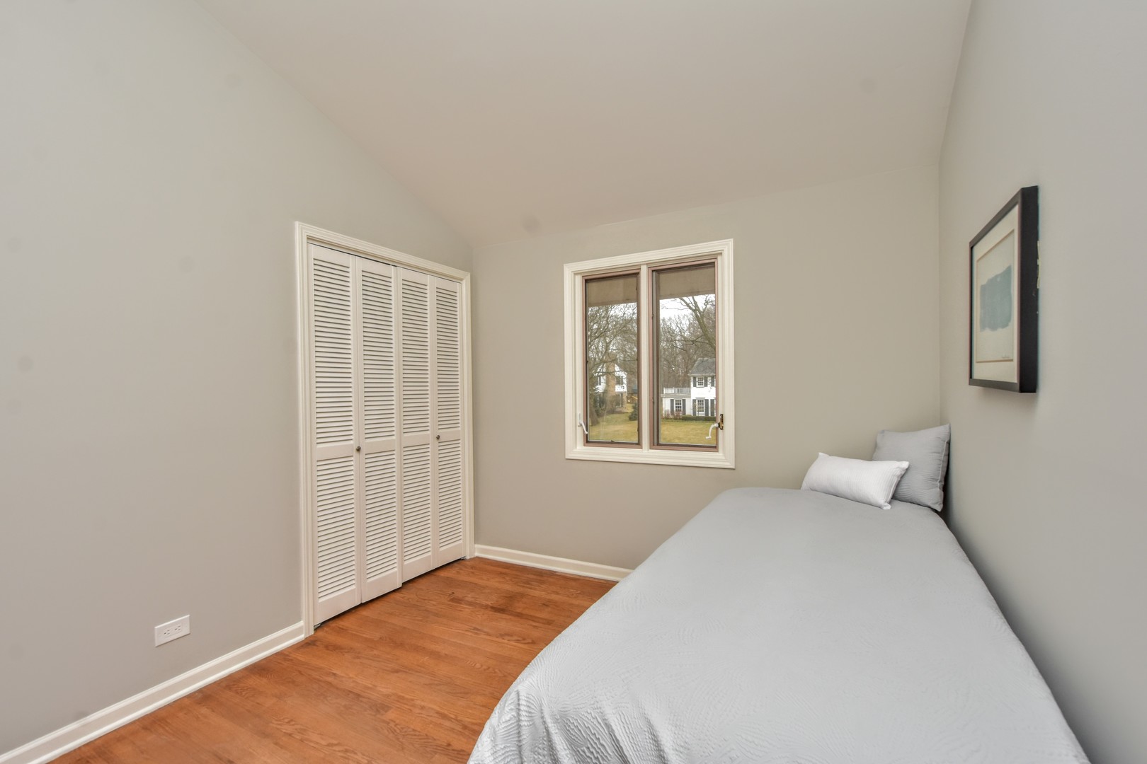 793 Cherokee Road Lake Forest, IL 60045 - Photo 27 of 39 a bedroom with a bed and a window
