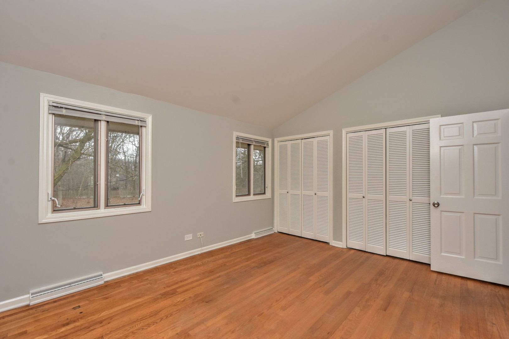 793 Cherokee Road Lake Forest, IL 60045 - Photo 32 of 39 a view of an empty room with wooden floor and a window