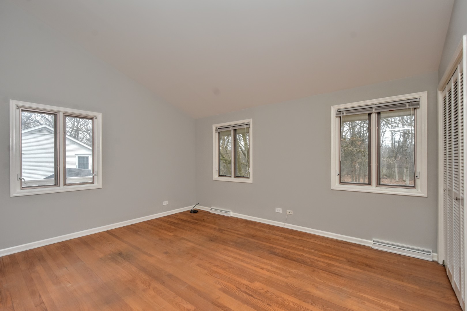 793 Cherokee Road Lake Forest, IL 60045 - Photo 33 of 39 a view of an empty room with wooden floor and a window