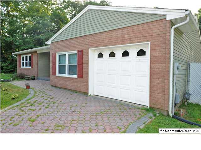 32 Lloyd Road Morganville, NJ 07751 - Photo 3 of 3 a backyard of a house