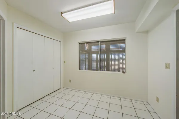 a view of an empty room with window