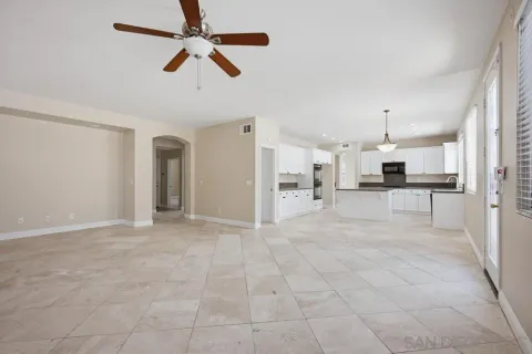 a view of a kitchen with furniture and a kitchen view