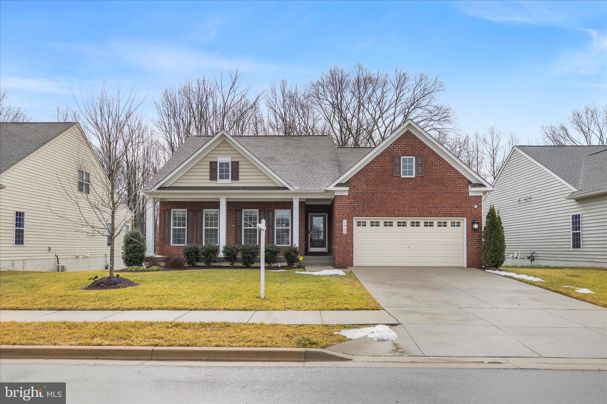 a view of a white house with a swimming pool