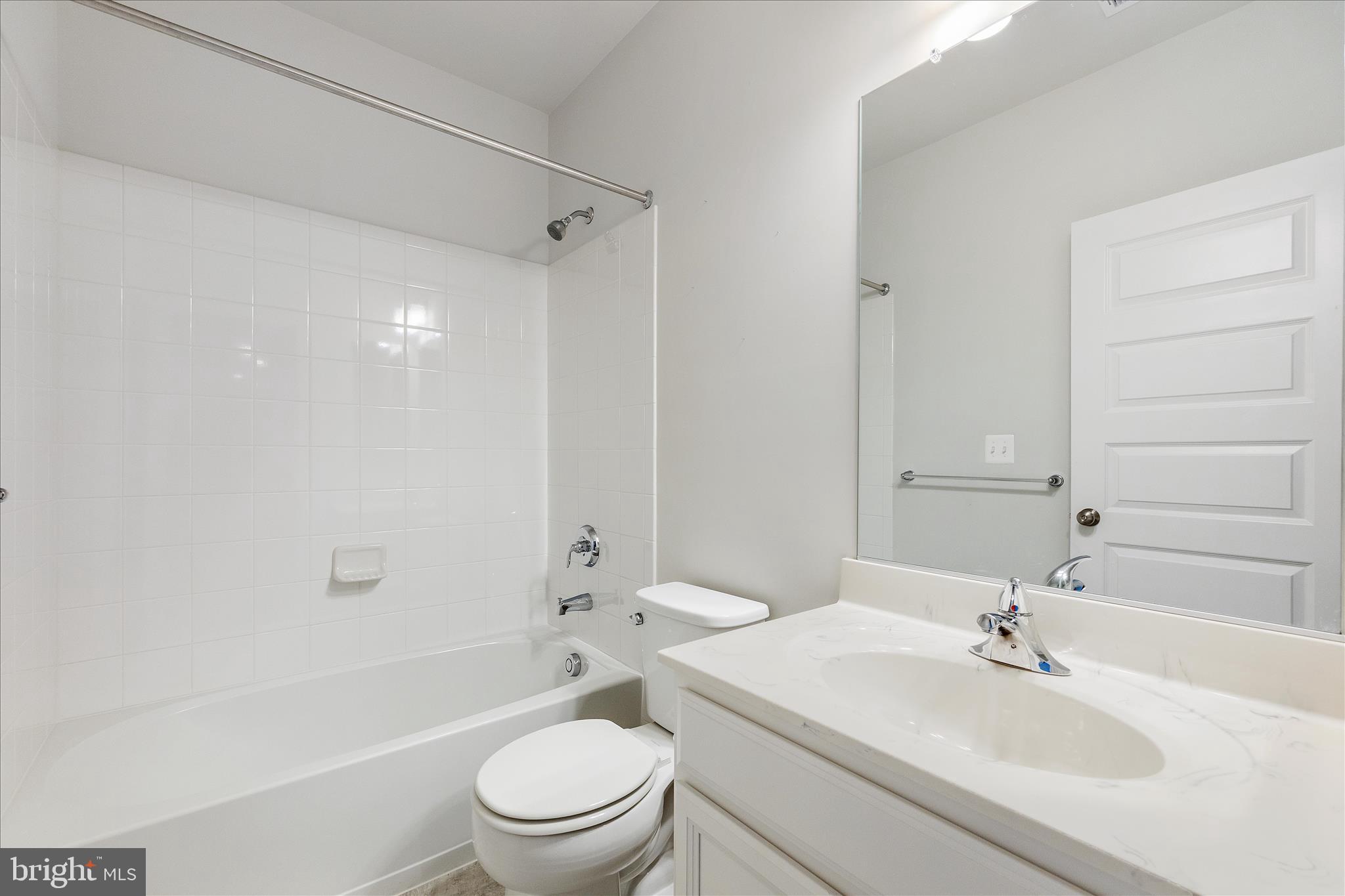 12706 Broughton Bluff Brandywine, MD 20613 - Photo 27 of 35 a bathroom with a sink toilet and shower