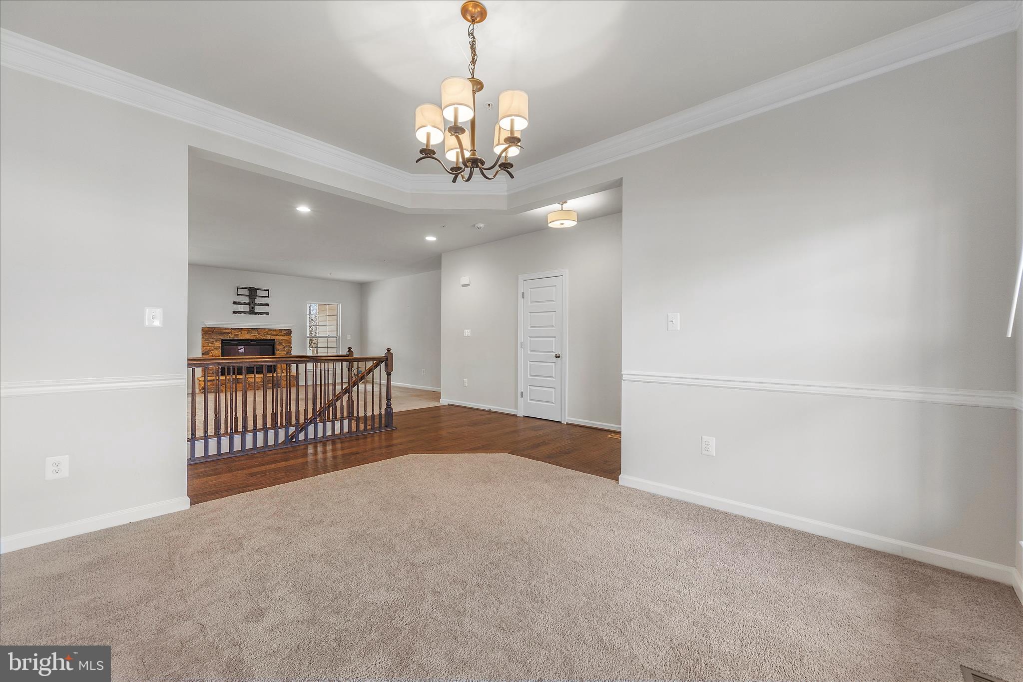 12706 Broughton Bluff Brandywine, MD 20613 - Photo 4 of 35 a view of a livingroom with chandelier and livingroom