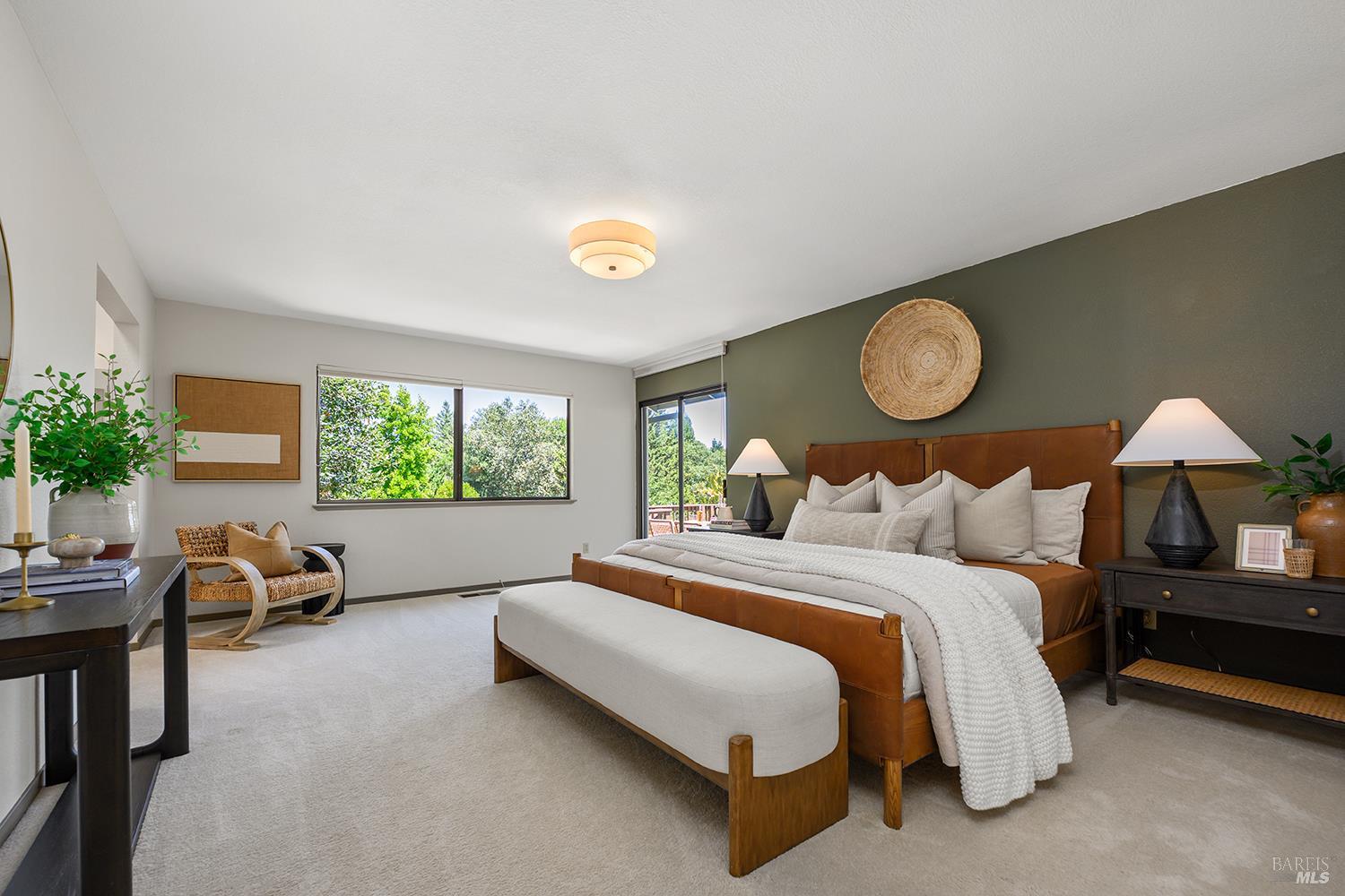 7595 Giusti Road Forestville, CA 95436 - Photo 25 of 41 a bedroom with bed and a large window