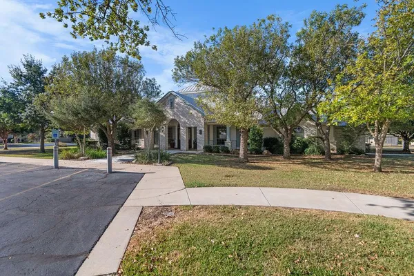 a view of a yard with a house
