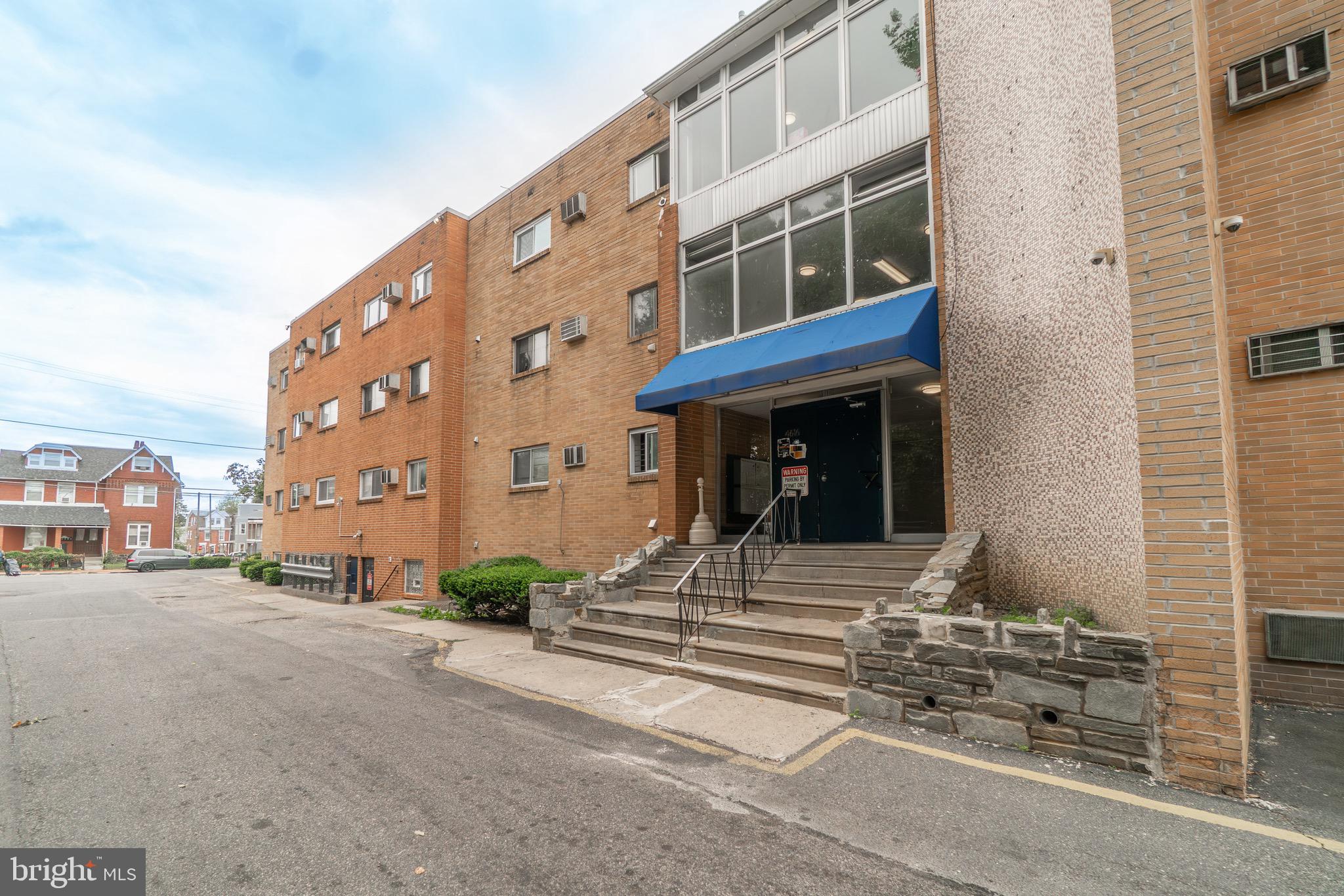 4616 Leiper Street, Unit A8 Philadelphia, PA 19124 - Photo 11 of 12 a view of a building along the street