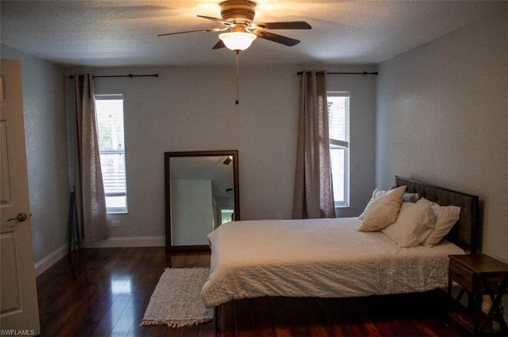 17565 Butler Road Fort Myers, FL 33967 - Photo 5 of 12 a bedroom with a bed and a window