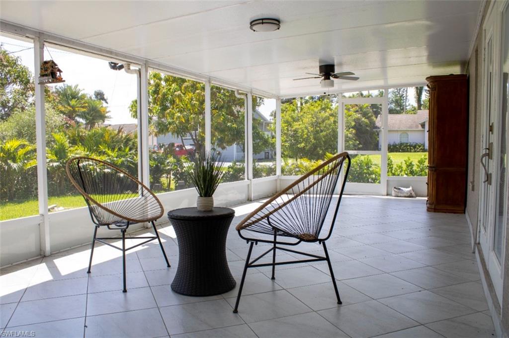 17565 Butler Road Fort Myers, FL 33967 - Photo 8 of 12 a view of a swimming pool and outdoor seating