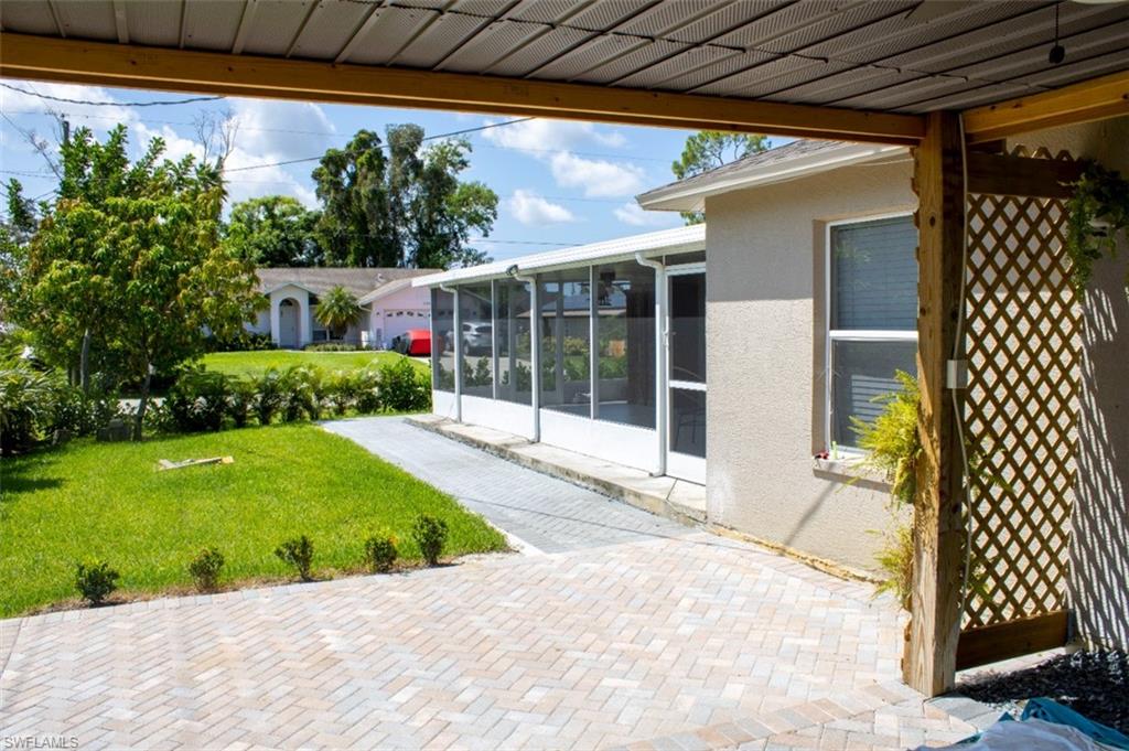 17565 Butler Road Fort Myers, FL 33967 - Photo 9 of 12 a view of a backyard door of the house