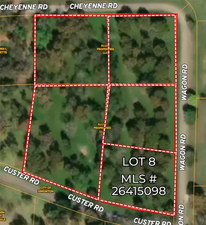 a street sign that is sitting on a wall