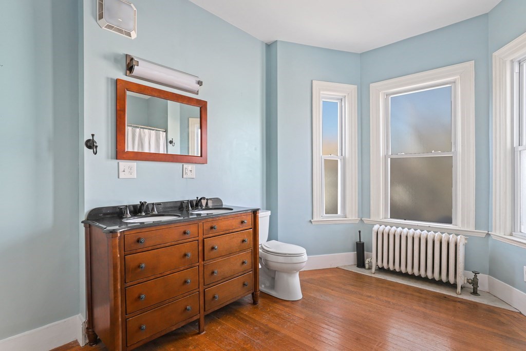 175 High Street Taunton, MA 02780 - Photo 16 of 39 a room with baby crib and window