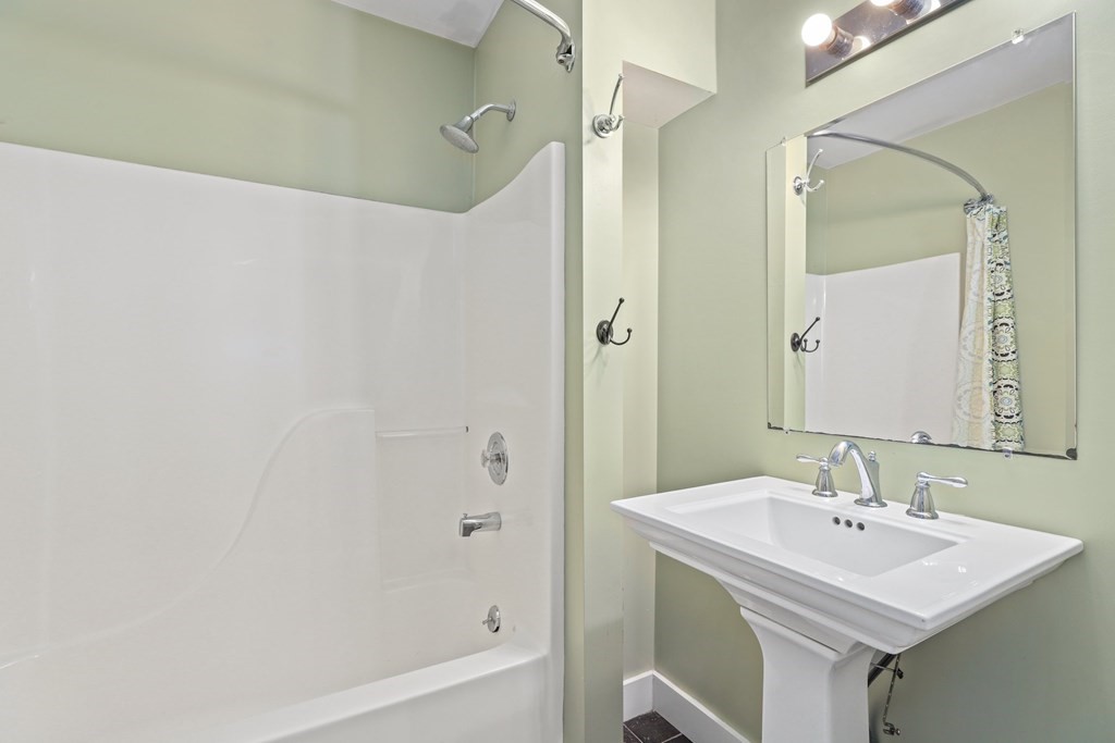 175 High Street Taunton, MA 02780 - Photo 32 of 39 a bathroom with a sink and a mirror