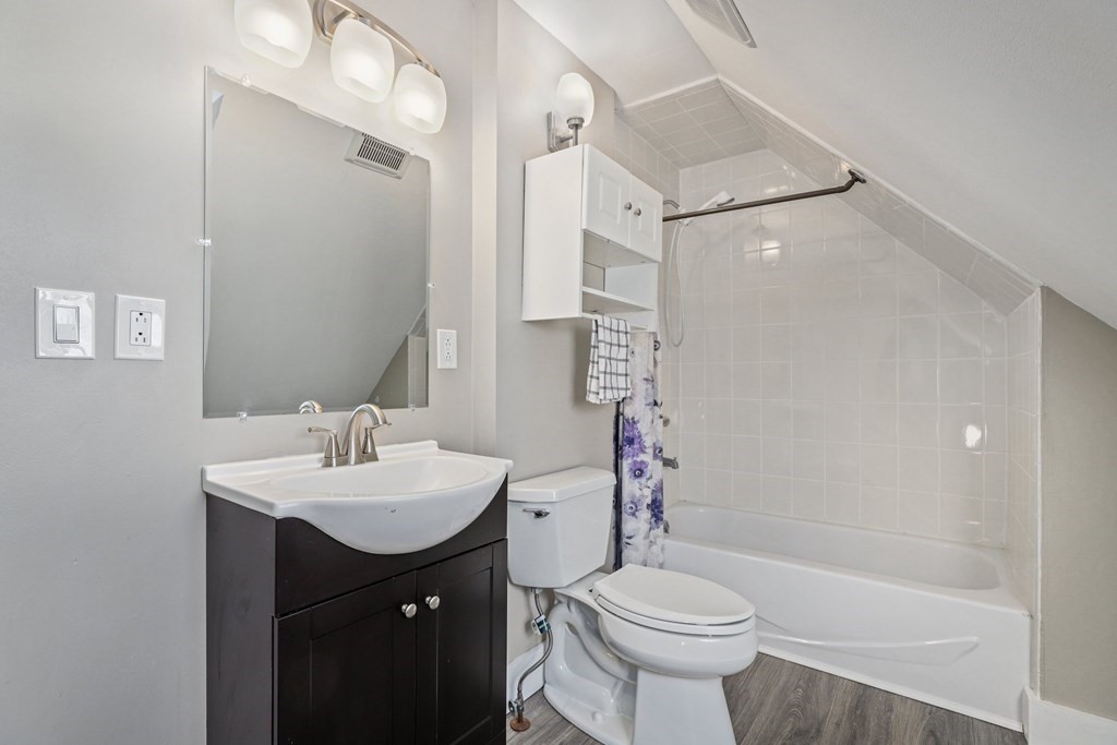 175 High Street Taunton, MA 02780 - Photo 33 of 39 a bathroom with a sink toilet vanity and shower