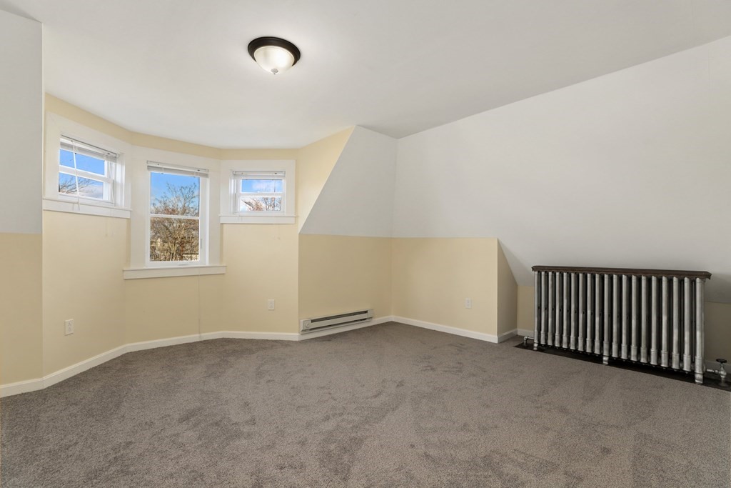 175 High Street Taunton, MA 02780 - Photo 36 of 39 a view of an empty room with windows
