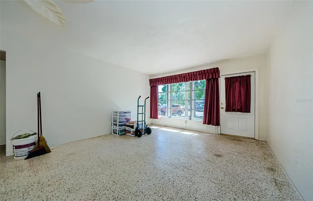 an empty room with windows