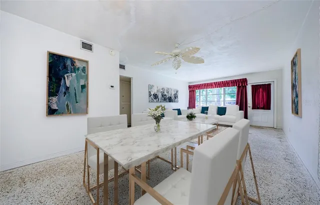 a view of a dining room with furniture