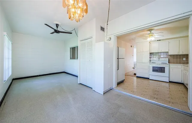 a view of cabinets and washer dryer