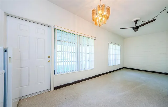 a view of a building with sitting area