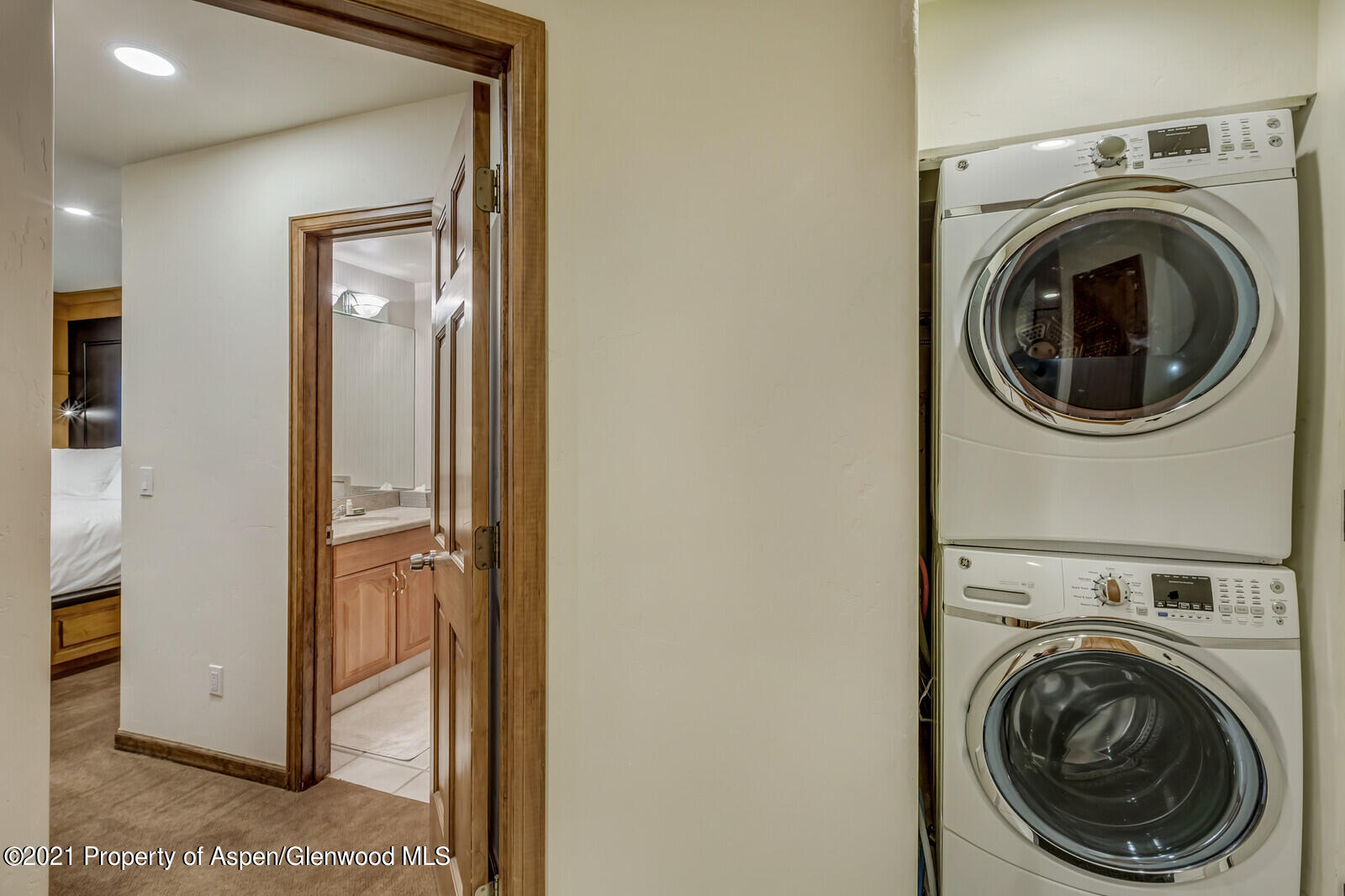 650 South Monarch Street, Unit 6 Aspen, CO 81611 - Photo 15 of 28 a view of a hallway with washer and dryer