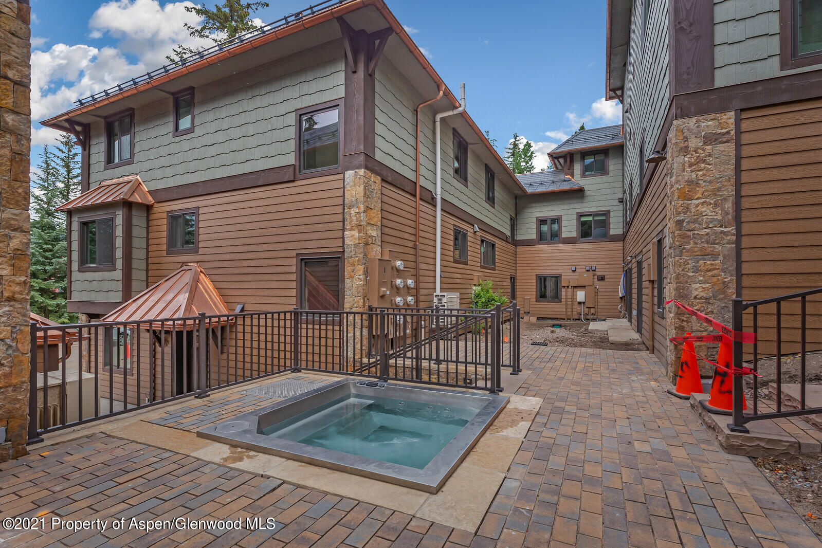 650 South Monarch Street, Unit 6 Aspen, CO 81611 - Photo 26 of 28 a view of a house with a wooden fence