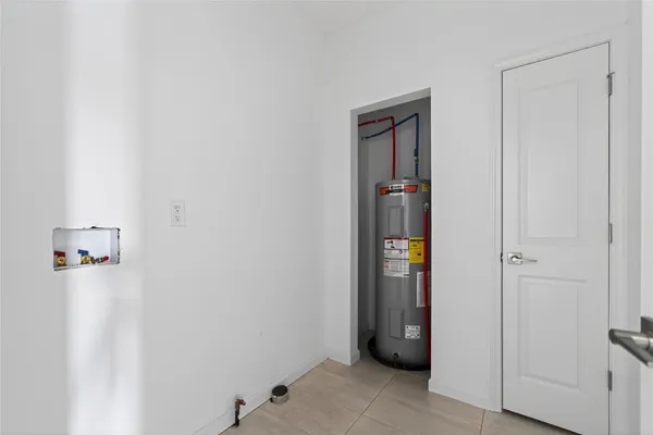 a view of an entryway with a hallway